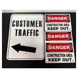 Four Traffic and Danger Signs