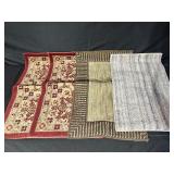 Four Multicolored Rugs