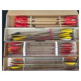 Archery Arrows in Storage Boxes