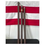 Three Brown Rod Storage Tubes