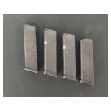 Four Glock Pistol Magazines