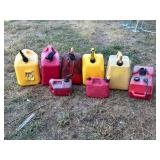 Eight Plastic Fuel Cans