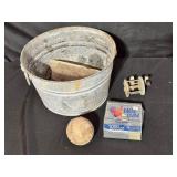 Bucket With Fishing Items and Ball