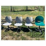 Four Plastic Swivel Office Chairs