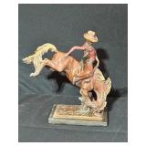 Bronze Sculpture of Cowboy on Bucking Horse