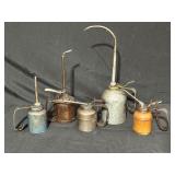 Five Vintage Oil Cans