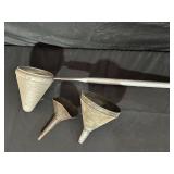 Three Metal Funnels
