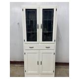 White Cabinet with Stained Glass Doors