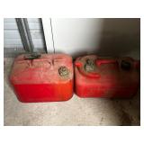 Two Red Plastic Fuel Containers