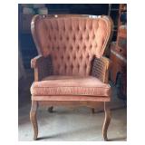 Tufted Wingback Chair With Cane Accents