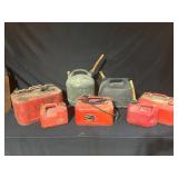 Seven Vintage Gasoline Cans