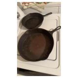 2 cast-iron skillets, a number 11 Wagner where