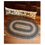 Very small oval braided rug, and a duck decorated