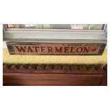 Carved wood, watermelon sign, with a small