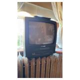 Small Sylvania 14 inch TV with a VHS digital tape