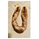 Antique mink, fur boa, fashions most flexible,