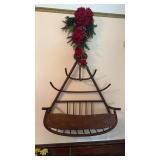 Antique wall hat rack with bottom pocket for