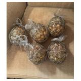 Five large wire Christmas ornaments  filled with