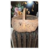 Small antique woven buttocks, basket, with a bent