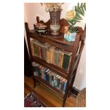 Three shelves bookcase, with two shelves of
