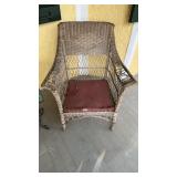 Antique wicker armchair, the arms are a little