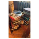 Collection of vintage books on the bottom of the