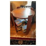Vintage roundtable for extended side legs, books