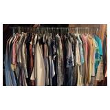 One hanging rack of vintage ladies clothes