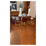 Seven bottles of perfume that includes realities,