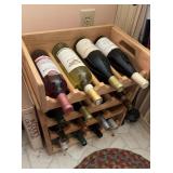 4 stacked wood wine bottle racks with the bottles