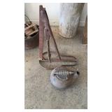 Cast-iron kettle, and a vintage tire changing to