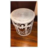 White wicker stool, few places of damage on the