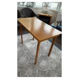 Small and tall table, on the back porch