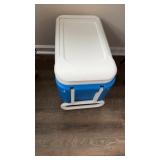Blue and white igloo cooler, with pull up handle