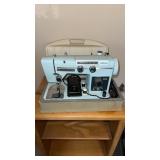 Vintage Fleetwood sewing machine, model 602, with