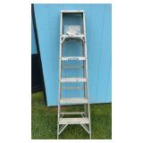 Warner 6 foot aluminum folding ladder in the back