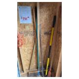 Corner lot of tools, that includes a digging bar,