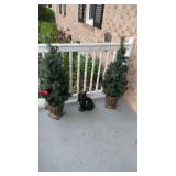 Two decorative Christmas trees, about 3 feet