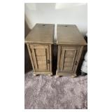 Two light green side tables, with doors in the