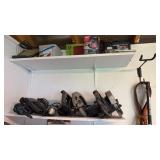 2 shelves of electric tools, that includes a