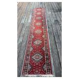12 foot long runner, with fringe on both ends,