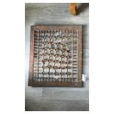 Square floor grate, with a repair piece in the