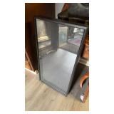 Black, framed shadowbox, with  a plexiglass