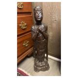 Large bronze clad statue of a woman