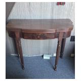 Antique game Table with a swing out leg and