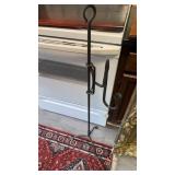 Blacksmith made iron candle stand, With a red