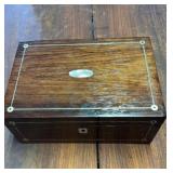 Mother Pearl, in laid jewelry box with a silver