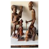 5 carved wood figures, different types of wood,