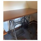 Singer Sewing machine treadle base, with a wooden