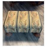 Vintage footstool on four large carved ball feet,
